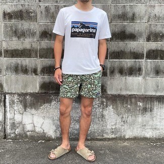 Olive Print Shorts Outfits For Men: For an off-duty ensemble with an urban spin, go for a white print crew-neck t-shirt and olive print shorts. Complement this getup with beige suede sandals to infuse a touch of stylish effortlessness into your ensemble.