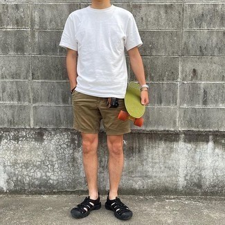 Black Canvas Sandals Outfits For Men: Definitive proof that a white crew-neck t-shirt and brown shorts are amazing when paired together in a casual outfit. Black canvas sandals will easily tone down a polished outfit.