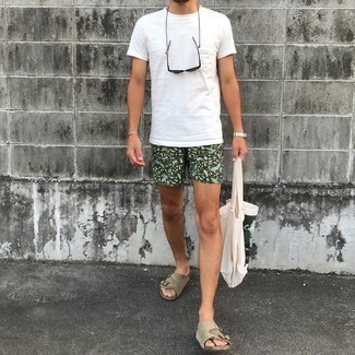 Dark Green Print Shorts Outfits For Men: Show your mellow side in a white crew-neck t-shirt and dark green print shorts. A pair of beige suede sandals will bring a playful touch to this ensemble.