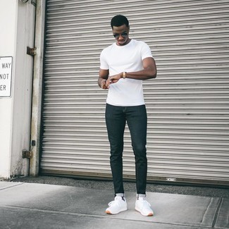 Charcoal Skinny Jeans Outfits For Men: If it's comfort and functionality that you're looking for in an ensemble, team a white crew-neck t-shirt with charcoal skinny jeans. The whole outfit comes together when you introduce a pair of white athletic shoes to your outfit.