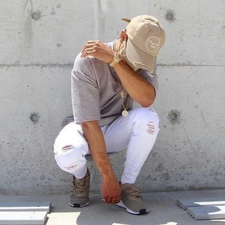 White Skinny Jeans Outfits For Men: Reach for a grey crew-neck t-shirt and white skinny jeans for a modern casual look that's easy to put together. A pair of tan athletic shoes is the glue that will tie this look together.