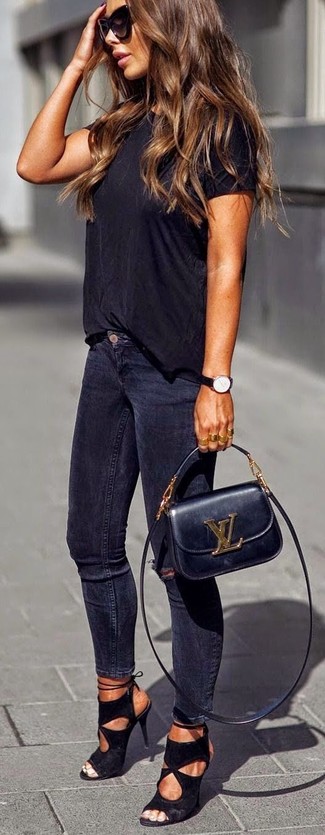 Black Suede Heeled Sandals Hot Weather Outfits: A black crew-neck t-shirt and navy skinny jeans will allow you to showcase your fashionable self. If you need to effortlessly rev up this outfit with footwear, why not complete your look with a pair of black suede heeled sandals?