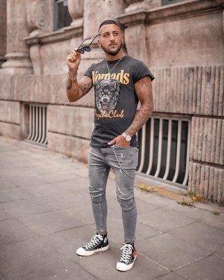 Grey Ripped Skinny Jeans Outfits For Men: We all look for practicality when it comes to styling, and this city casual combination of a charcoal print crew-neck t-shirt and grey ripped skinny jeans is a practical example of that. Finishing off with a pair of black print canvas high top sneakers is an effective way to introduce some extra classiness to your outfit.