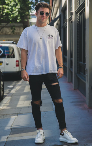 Men's White Print Crew-neck T-shirt, Black Ripped Skinny Jeans, White and Black Leather Low Top Sneakers, Black Sunglasses