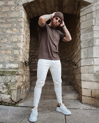 White Ripped Skinny Jeans Outfits For Men: This combo of a brown crew-neck t-shirt and white ripped skinny jeans is very easy to throw together and so comfortable to wear as well! White and black leather low top sneakers are an effective way to upgrade your ensemble.