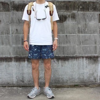 500+ Relaxed Hot Weather Outfits For Men: This relaxed casual combination of a white crew-neck t-shirt and navy print sports shorts is a winning option when you need to look cool but have zero time to plan a look. If not sure as to the footwear, introduce grey athletic shoes to your look.
