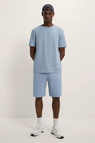 Aquamarine Shorts Outfits For Men: Pairing a light blue crew-neck t-shirt with aquamarine shorts is an on-point choice for a casual outfit. Introduce a pair of white athletic shoes to this ensemble to infuse a dose of stylish nonchalance into this getup.