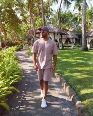 Grey Baseball Cap Outfits For Men: You're looking at the irrefutable proof that a pink crew-neck t-shirt and a grey baseball cap look awesome when combined together in a casual ensemble. White athletic shoes are guaranteed to infuse an extra touch of style into your look.