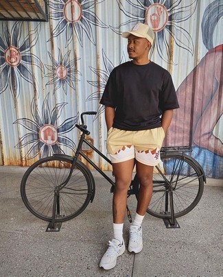 Tan Print Sports Shorts Outfits For Men: If you're looking for an off-duty yet stylish ensemble, consider teaming a black crew-neck t-shirt with tan print sports shorts. A pair of white athletic shoes is a great choice to round off this ensemble.