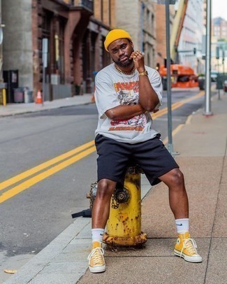 Orange Beanie Outfits For Men: Consider pairing a white print crew-neck t-shirt with an orange beanie for a kick-ass and fashionable outfit. Balance out this look with a more polished kind of shoes, like these mustard canvas high top sneakers.