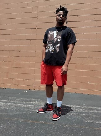 Red Leather High Top Sneakers Outfits For Men: A black print crew-neck t-shirt and red sports shorts are a savvy outfit worth incorporating into your current fashion mix. To give your overall look a smarter finish, introduce red leather high top sneakers to this getup.