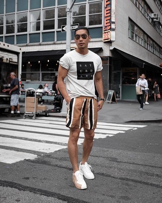 Tobacco Shorts Outfits For Men: A dapper combo of a white and black print crew-neck t-shirt and tobacco shorts will bring confidence and you'll carry yourself with more self-assurance. Our favorite of a variety of ways to complement this ensemble is white leather low top sneakers.