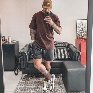 Men's Brown Crew-neck T-shirt, Charcoal Sports Shorts, White and Black Leather Low Top Sneakers, Tan Baseball Cap