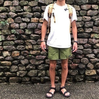 Tan Canvas Backpack Outfits For Men: For a casual and cool outfit, try teaming a white crew-neck t-shirt with a tan canvas backpack — these items play well together. A pair of black canvas sandals instantly amps up the cool of your ensemble.