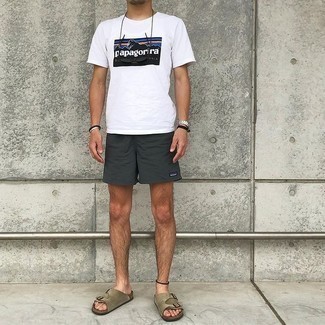 Olive Sandals Outfits For Men: A white print crew-neck t-shirt and charcoal sports shorts are a nice pairing to keep in your day-to-day casual rotation. Feeling transgressive today? Shake things up by slipping into a pair of olive sandals.