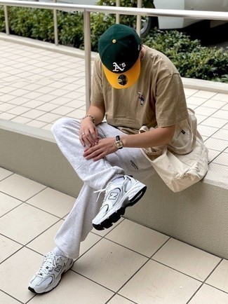 Dark Green Print Baseball Cap Outfits For Men: If it's ease and functionality that you love in an ensemble, dress in a tan crew-neck t-shirt and a dark green print baseball cap. If you feel like playing it up a bit, complement this look with white athletic shoes.