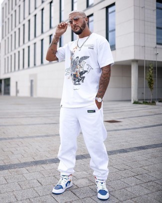 White Sweatpants Outfits For Men: If you gravitate towards bold casual combinations, why not consider this combo of a white print crew-neck t-shirt and white sweatpants? Let your sartorial skills truly shine by rounding off this look with white and blue leather high top sneakers.