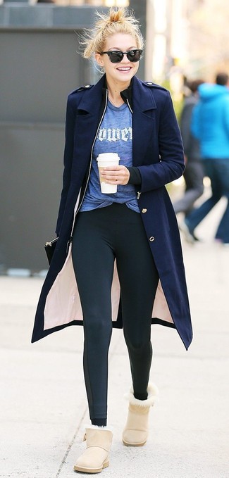 Gigi Hadid wearing Black Leggings, Blue Print Crew-neck T-shirt, Black Zip Sweater, Navy Coat