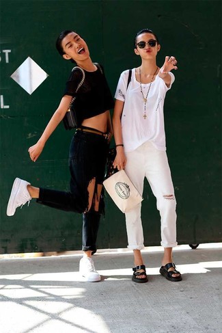 Dark Brown Leather Belt Outfits For Women: If you're all about being comfortable when it comes to dressing up, this pairing of a black cropped top and a dark brown leather belt is just for you. Feeling bold today? Polish off your look by sporting white leather high top sneakers.