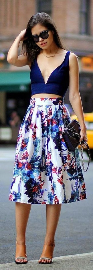 Navy Cropped Top Outfits: Perfect the effortlessly stylish getup by wearing a navy cropped top and a white floral full skirt. Complement this ensemble with tan leather mules to take things up a notch.