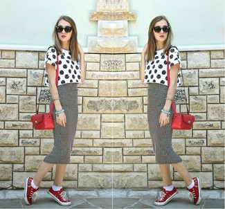 Women's White and Black Polka Dot Cropped Top, Black and White Polka Dot Midi Skirt, Red Low Top Sneakers, Red Leather Crossbody Bag
