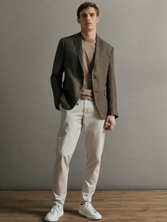 Dark Brown Blazer Outfits For Men: Consider wearing a dark brown blazer and white chinos to put together an interesting and well-executed ensemble. Kick up the wow factor of this ensemble by slipping into white canvas low top sneakers.