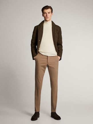 White Turtleneck Outfits For Men: A white turtleneck and khaki chinos have become indispensable wardrobe styles for most gentlemen. For a more sophisticated touch, introduce a pair of dark brown suede chelsea boots to the equation.