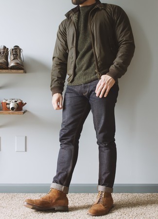 Dark Brown Bomber Jacket Outfits For Men: This relaxed casual combination of a dark brown bomber jacket and navy jeans is perfect if you need to go about your day with confidence in your ensemble. To introduce a little fanciness to your ensemble, complement this getup with a pair of brown suede casual boots.
