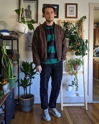Men's Dark Brown Bomber Jacket, Navy and Green Horizontal Striped Polo, Navy Jeans, Brown Canvas High Top Sneakers