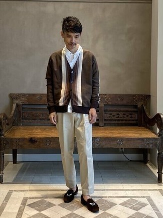 Cardigan Outfits For Men: This combination of a cardigan and grey chinos is beyond stylish and provides instant off-duty cool. When it comes to footwear, go for something on the smarter end of the spectrum and complete your getup with a pair of dark brown embroidered velvet loafers.