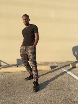 army pants and black shirt