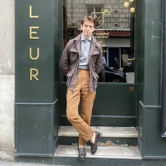 Dark Brown Field Jacket Outfits: This combination of a dark brown field jacket and khaki cargo pants is ideal for casual occasions. And it's amazing what dark brown leather loafers can do for the getup.