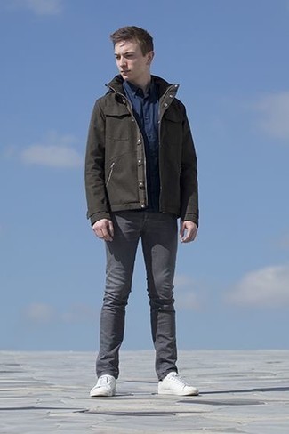 Dark Brown Field Jacket Outfits: Try pairing a dark brown field jacket with charcoal jeans to create an everyday outfit that's full of charisma and character. A pair of white canvas low top sneakers is a goofproof footwear option that's also full of character.