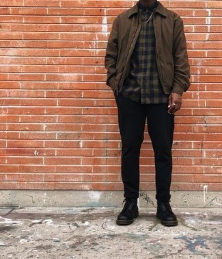 Dark Brown Gingham Long Sleeve Shirt Outfits For Men: This cool and relaxed outfit is so simple: a dark brown gingham long sleeve shirt and black chinos. Want to go all out when it comes to footwear? Complete your getup with a pair of black leather casual boots.