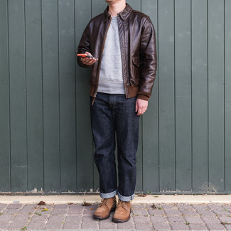 Dark Brown Leather Harrington Jacket Outfits: A dark brown leather harrington jacket and navy jeans married together are a perfect match. If you want to easily up the ante of this outfit with one single piece, add brown suede casual boots to the equation.