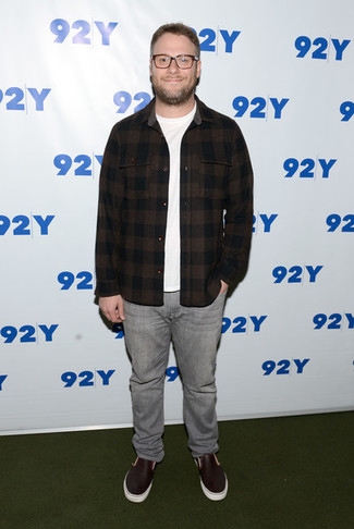 Seth Rogen wearing Dark Brown Check Flannel Long Sleeve Shirt, White Crew-neck T-shirt, Grey Jeans, Burgundy Leather Slip-on Sneakers