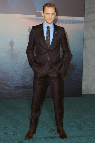 Tom Hiddleston wearing Black Floral Tie, Dark Brown Leather Oxford Shoes, Blue Dress Shirt, Dark Brown Suit