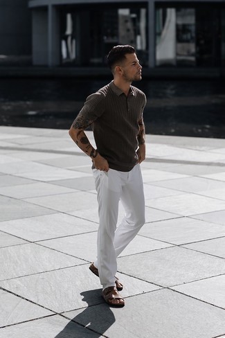 500+ Relaxed Hot Weather Outfits For Men: For a cool and relaxed look, make a dark brown polo and white chinos your outfit choice — these items play really great together. A pair of brown leather sandals will effortlessly dress down a dressy look.
