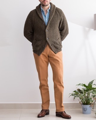 Dark Brown Shawl Cardigan Outfits For Men: For an ensemble that's worthy of a modern fashion-forward gentleman and effortlessly classic, consider teaming a dark brown shawl cardigan with tobacco chinos. We're loving how cohesive this outfit looks when complemented by dark brown leather desert boots.