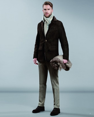 Brown Shearling Coat Outfits For Men: Bump up the style factor in a brown shearling coat and grey wool dress pants. A pair of dark brown suede derby shoes finishes this outfit very well.