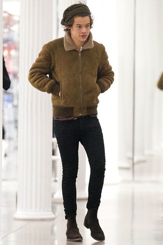 Harry Styles wearing Dark Brown Suede Chelsea Boots, Black Skinny Jeans, Olive Shearling Jacket