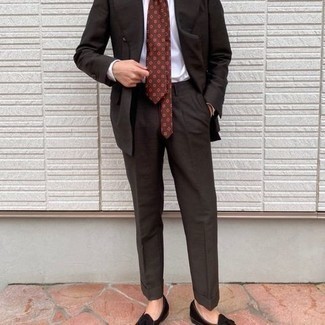 Brown Print Tie Summer Outfits For Men In Their 30s: Go for a dark brown suit and a brown print tie for a sleek classy look. Don't know how to finish off? Complement your look with black velvet tassel loafers for a more laid-back twist. Entirely appropriate for hot weather, you can rock this look throughout the season. Like this style idea for a 30-something Millennial guy?