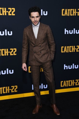 Christopher Abbott wearing Dark Brown Suit, White Vertical Striped Dress Shirt, Brown Leather Chelsea Boots