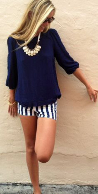 Women's Beige Necklace, Dark Brown Sunglasses, White and Navy Vertical Striped Shorts, Navy Long Sleeve T-shirt