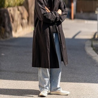 Trenchcoat Outfits For Men: This combo of a trenchcoat and light blue jeans speaks manly sophistication and versatility. Send an otherwise mostly dressed-up look in a more casual direction by finishing with white canvas low top sneakers.