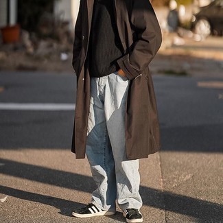 Men's Dark Brown Trenchcoat, Black Crew-neck Sweater, Light Blue Jeans, Black and White Suede Low Top Sneakers