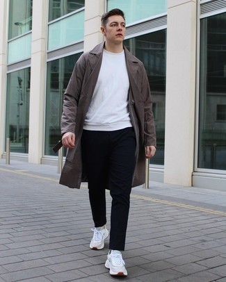 Dark Brown Trenchcoat Outfits For Men: We love how this semi-casual combination of a dark brown trenchcoat and navy chinos instantly makes men look stylish. Add grey athletic shoes to the equation to add a hint of stylish casualness to this getup.