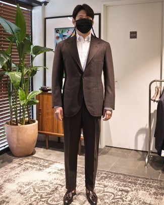 Dark Brown Wool Suit Outfits: To look like a contemporary gentleman, choose a dark brown wool suit and a white dress shirt. Grab a pair of dark brown leather tassel loafers to keep the look fresh.