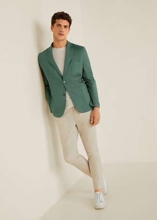 Olive Blazer Outfits For Men: Such essentials as an olive blazer and beige chinos are an easy way to introduce extra polish into your casual arsenal. Wondering how to round off? Introduce a pair of white leather low top sneakers to the mix to jazz things up.