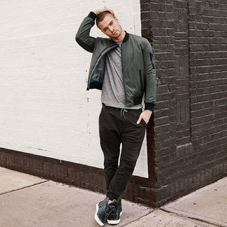 Dark Brown Chinos Outfits: A dark green bomber jacket and dark brown chinos are great menswear staples that will integrate really well within your off-duty routine. If you need to effortlessly dial down your ensemble with a pair of shoes, add a pair of dark green leather high top sneakers to the equation.